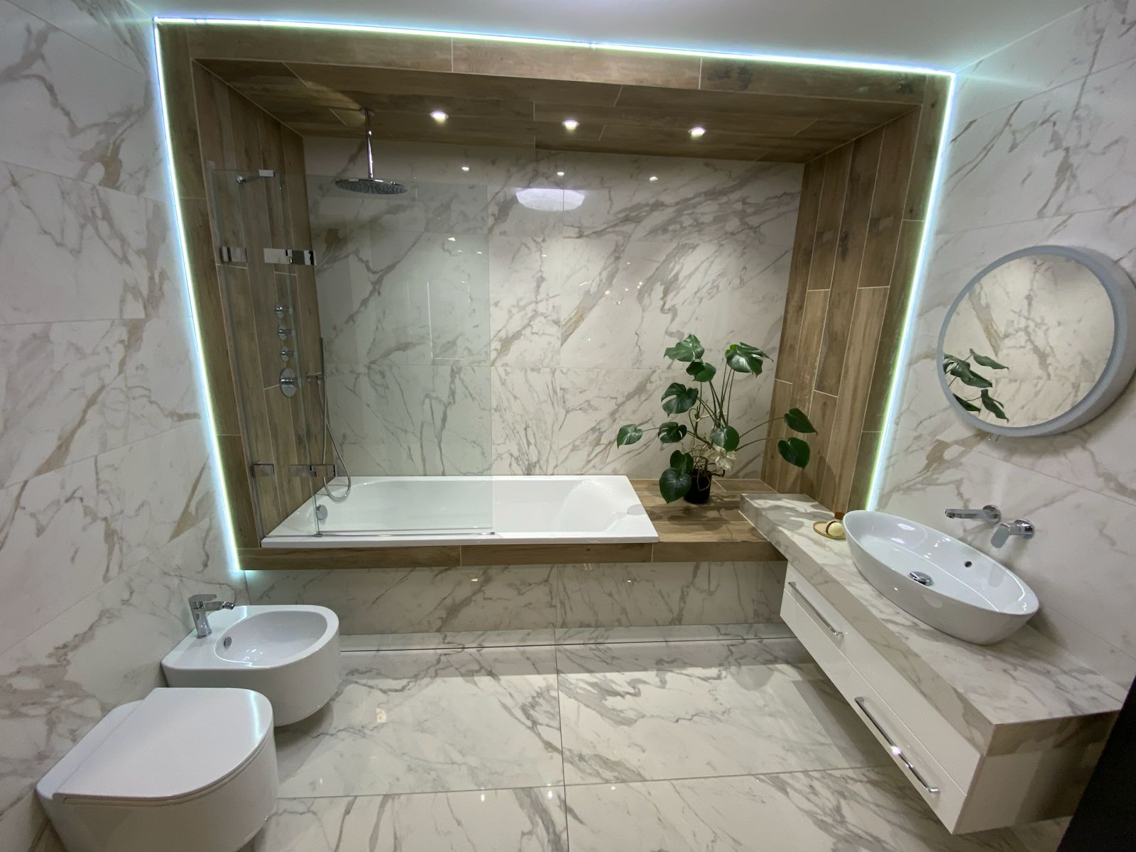 Marble-effect bathroom with integrated bath lighting